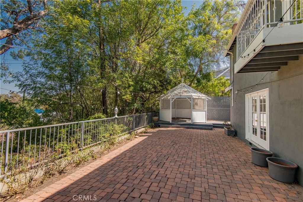 Photo of 4602 Hurford Terrace, Encino, CA 91436 (MLS # SR25195846)