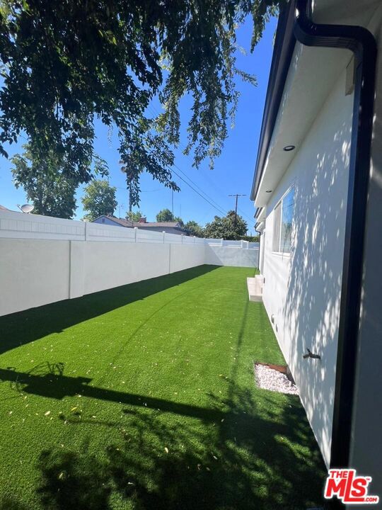 3 Br Home situated on one lot Luxurious Living in North Hollywood Close to EVERYTHING! SHARED WITH TWO OTHER NEWLY DEVELOPED UNITS!! 3 Bedrooms, 2 Baths at 1500 sqft, Bright, light, open w/Amazing Cook s Kitchen. This HOUSE has been meticulously renovated and looks NEW. Enjoy the elegance of luxury flooring, new windows, doors, paint, creating a space that exudes timeless charm and contemporary allure.