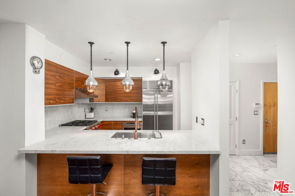 Photo of 159 W Green Street #304A, Pasadena, CA 91105 (MLS # 25615129)