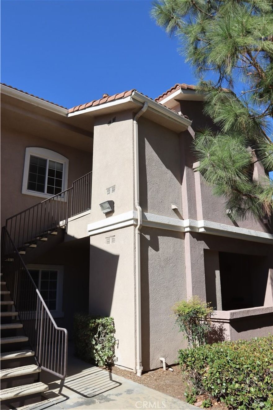 Beautiful 2-Bedroom Condo in Gated Murrieta Community | The Reserves at Madison Park

Welcome to resort-style living at The Reserves at Madison Park! This beautifully maintained 2-bedroom, 2-bathroom condominium offers a blend of comfort, style, and security within a highly sought-after gated community in Murrieta, CA. This home provides an exceptional lifestyle with top-tier community amenities and a functional, attractive living space.

Step inside to discover a bright and airy split floorplan that gracefully separates the bedrooms for added privacy. The spacious living room is perfect for relaxation and features a cozy fireplace, opening directly onto a private, covered patio for seamless indoor-outdoor living. The kitchen comes fully equipped with essential appliances, including a dishwasher, stove, and refrigerator, and seamlessly connects to a dedicated dining area. A convenient built-in computer desk/work area just off the kitchen is ideal for a dedicated home office setup or study space. The in-unit laundry room, complete with an included washer and dryer, is conveniently located adjacent to the kitchen. Both bedrooms ensure comfort with ceiling fans installed.

Parking and storage are a breeze, as this unit includes both a one-car garage and an additional covered, designated parking space. The location within the community is ideal—close enough to amenities but set back from distracting street noise. Furthermore, the property is perfectly situated in Murrieta, offering quick access to the freeway, local parks, diverse shopping centers, and abundant entertainment options.

As a resident of this exclusive gated community, you'll enjoy full access to resort-style amenities that make every day feel like a vacation. These outstanding features include a sparkling pool and spa, a fitness center, a clubhouse for social gatherings, a picnic area, and a playground. ***AVAILABLE FOR IMMEDIATE MOVE-IN***