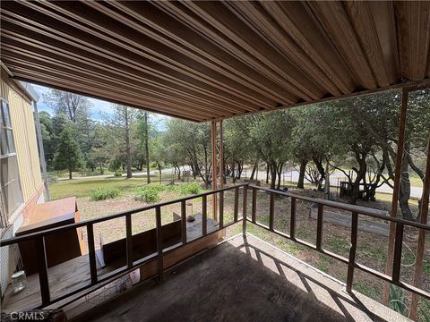 Photo of 38833 Terri Lane Ln, Oakhurst, CA 93644 (MLS # MP26076910)