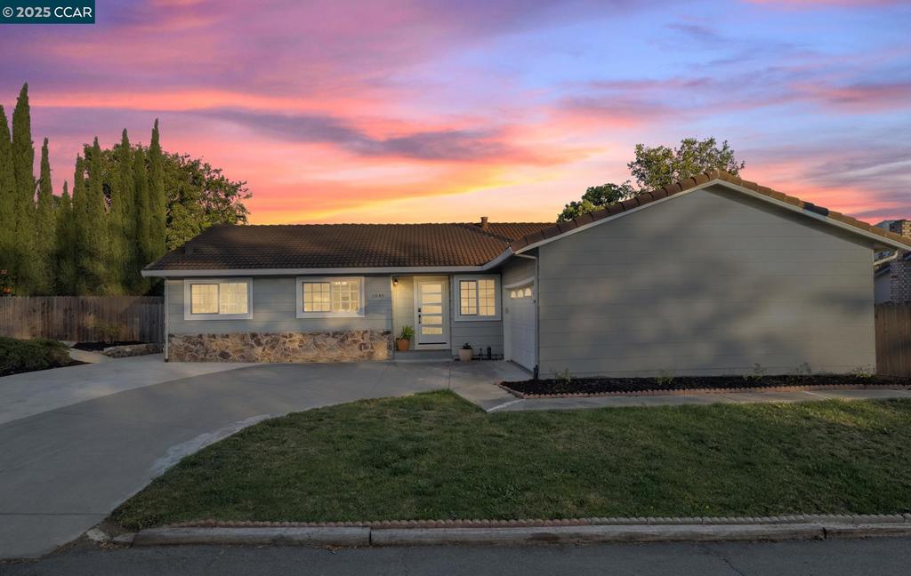 Welcome to 1840 Leo Ln! This meticulously updated single-story rancher rests on an expansive 10,000 sq. ft. lot, offering a spacious front yard, freshly paved back patio, and raised garden beds bursting with herbs, tomatoes, pumpkins, and more- all framed by stunning views of Mt. Diablo. Inside, enjoy completely renovated kitchen and baths (2021) featuring quartz counters, custom cabinetry, newer gas range, and modern fixtures. Additional upgrades include newer HVAC and water heater (2021), new whole home PEX plumbing system (2025), luxury vinyl flooring (2025), fresh interior paint (2025), a newer GE front-load washer and dryer (2021), new keyless entry front door, and more. Truly move-in ready! Vaulted ceilings, an open floor plan, and a cozy fireplace bring charm and comfort to the living space. The wide driveway provides ample bonus parking and adds to the home’s inviting curb appeal. Outside, relax or entertain in the private backyard with new fence and patio. All this while enjoying Concord pricing just minutes from the Clayton border- just minutes from the Concord Pavilion, scenic trails, downtown Clayton’s small-town charm and Walnut Creek’s vibrant dining and shopping.