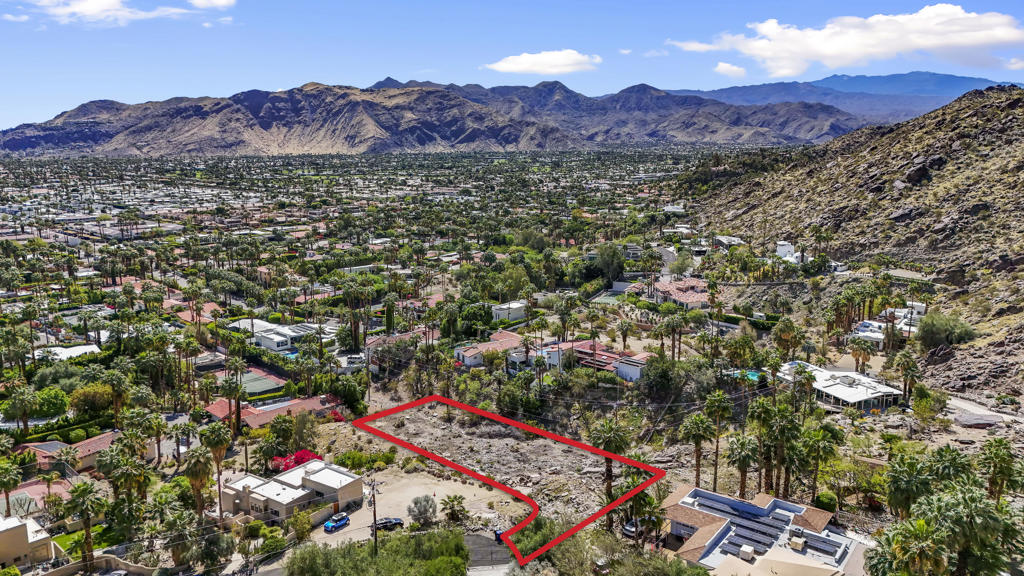 $45,000 Price Reduction!! Welcome to The Mesa! The most desired hillside location in South Palm Springs. This 37,000+ hillside lot is located just adjacent to what is touted by many as the home Zane Grey used as his desert retreat and drew inspiration from the enchanting views. A rare piece of Old Hollywood history, Mr. Zane Grey was a well know Western author. Even more enticing are the spectacular views of the whole Coachella Valley! This space is meant for the most special of modern homes to be built, bring your architectural & design team to showcase the most grand views that many desire when visiting our beautiful Coachella Valley and a gorgeous back drop of the San Jacinto Mountain that feels as though you could reach out and touch it. As you take in the stunning views, experience the elevation and enjoy a floor of Palm Trees beneath you as far as the eye can see. Don't miss out on this rare opportunity to own property in the historically rich hillside of The Mesa offering incredible views!