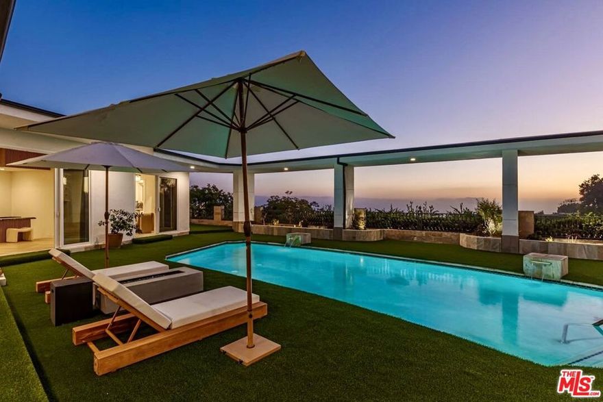 Fully Remodeled! Experience the pinnacle of luxury living on Chalette Drive, renowned as "Billionaire's Road" in Trousdale Estates, one of Beverly Hills' most exclusive addresses. This fully remodeled designer estate seamlessly blends modern sophistication with timeless elegance, offering breathtaking skyline and city views from nearly every room. Behind its private gates, this stunning residence boasts five spacious bedroom suites and fiveandahalf spalike bathrooms, each designed with comfort and style in mind and appointed with brandnew highend furnishings. Every suite features its own ensuite bath, creating the perfect balance of privacy and indulgence.The chef's kitchen is a masterpiece, equipped with professional grade appliances, custom cabinetry, and an open layout that flows effortlessly into expansive living and dining areas ideal for both entertaining and everyday living. Floor to ceiling windows invite natural light while framing the dazzling cityscape below, creating an unmatched indoor-outdoor living experience. Designed for the discerning resident, this estate offers flexible lease terms and is delivered fully furnished to the highest standard. Whether for a mid-term stay or a longterm lease, the residence adapts to your lifestyle needs. Please call for availability and pricing. Please note we accept cryptocurrency as a form of payment.