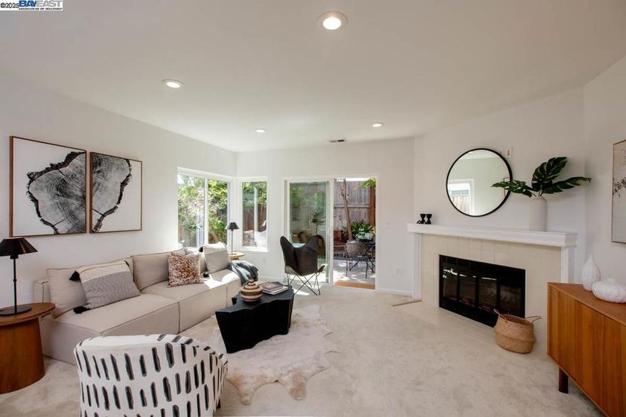 Located in Alameda's desirable Harbor Bay Isle at Brittany Landing Bay HOA, this 2-story townhome is close to top-ranked schools, parks and the SF Bay Trail. Recently updated, this sophisticated contemporary home features 2 ensuite bedrooms, 2.5 bathrooms, an open living room/dining room combination, an eat-in kitchen, laundry room, a private backyard patio, an attached garage and an additional reserved parking space. Details include updated bathrooms, a w/b fireplace, dual-pane windows, new light fixtures, a freshly painted interior and plenty of bright, natural light throughout. The sunny, updated kitchen has black granite counters, bay windows + stainless steel appliances. The primary bedroom features multiple large closets, a vaulted ceiling, a private balcony and a spacious ensuite bathroom. The HOA includes a heated community pool + spa. Just minutes to Earhart Elementary + Lincoln Middle schools, this prime location offers close proximity to a lagoon trail/path, a toddler playground, Veterans' Park + the Harbor Bay Club. Convenient to Harbor Bay Landing Safeway/Starbucks and the many amenities at South Shore Center and downtown Park Street. Nearby commuter options include ACTransit, the SF Ferry and easy freeway access. Wonderful, move-in condition!