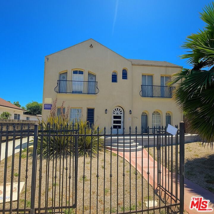 Discover an exceptional income-producing property located just minutes from USC. This well-maintained, gated 4-unit building features three spacious 2-bedroom/1-bath units and one charming 1-bedroom/1-bath unit. Residents enjoy the convenience of 8 gated parking spaces, offering ample room for tenants and guests. With low operating expenses and strong rental demand in this highly desirable area, this property presents outstanding potential for both steady cash flow and long-term appreciation. The lot layout offers ADU potential (buyer to verify), adding an opportunity to increase rental income even further. Situated close to USC, Exposition Park, public transit, and major freeways, this property benefits from consistent tenant demand year-round. Whether you're an investor seeking reliable returns or a developer looking for value-add possibilities, this is a prime opportunity in one of Los Angeles' fastest-growing rental markets.