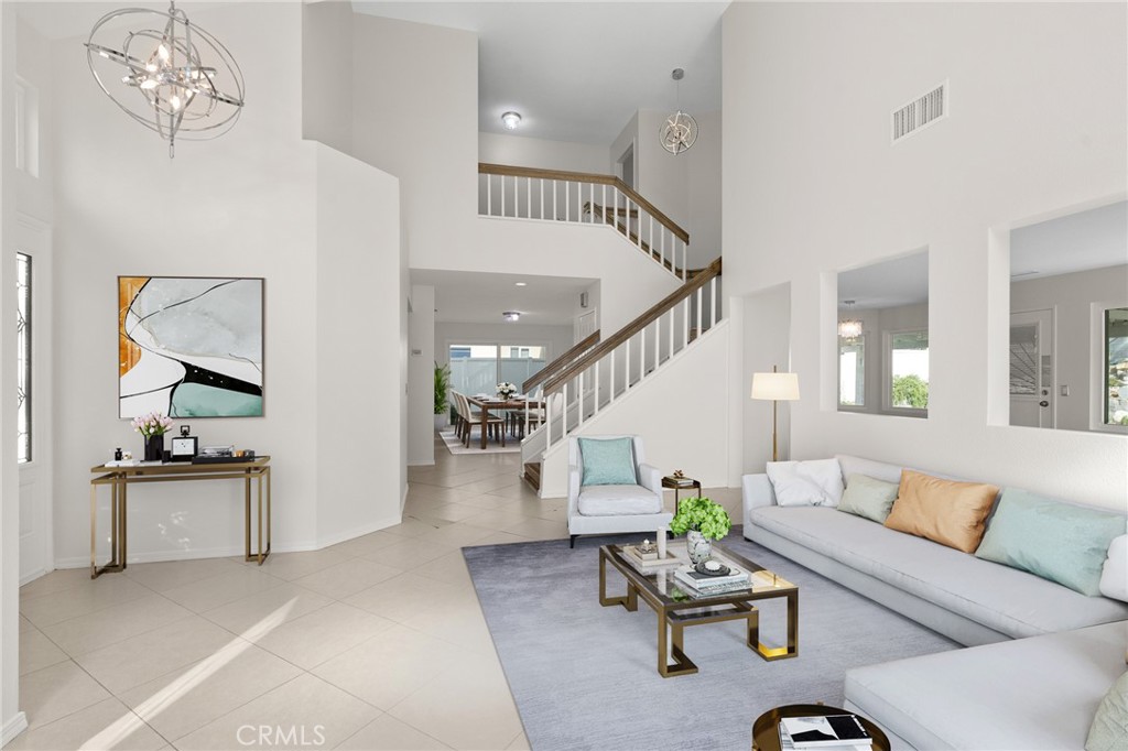 This spacious 4-bedroom home includes a bonus sitting area off the Primary Suite—perfect for a home office. The kitchen and primary bath have been tastefully remodeled, and the entire interior has brand new paint. Enjoy high ceilings, tile and wood flooring, formal living and dining rooms, and a family room open to the kitchen—ideal for gatherings. A main-level bedroom and full bath offer added flexibility. The 3-car garage includes an EV charger, and recent upgrades include New Windows, a New HVAC system, and PAID-OFF solar panels all within the last three years. The backyard features a covered patio, built-in BBQ, and large storage shed—perfect for entertaining. Located in the highly desirable Orangecrest community, close to schools, parks, and more. Don’t miss this move-in ready gem!