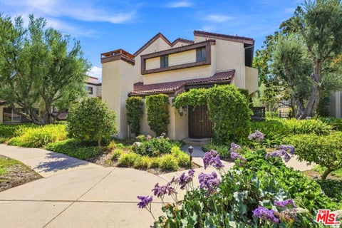 Photo of 21801 Burbank Boulevard #83, Los Angeles, CA 91367 (MLS # 26949541)