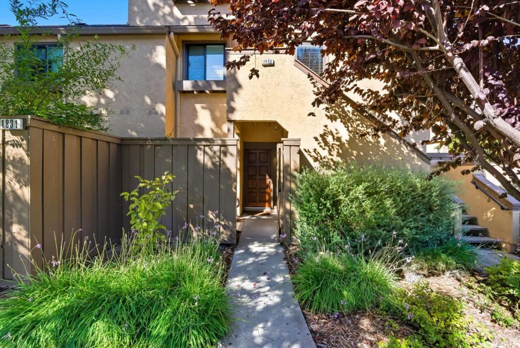 Welcome to 1831 Ashmeade Ct, a beautifully remodeled single-story condo in a great location in the coveted 1600 Hamilton Place development. This desirable single-story, first floor end unit includes two bedrooms and two bathrooms, including a large en-suite with access to a private patio. The updated kitchen showcases shaker cabinets, granite counters, and ample storage, opening to a large dining and living room, ideal for entertaining. The spacious living room beckons with a cozy fireplace and slider out to a private patio. Both bathrooms are tastefully updated with shaker vanities and stone counters. Features include in-unit laundry area, newer dual pane windows and sliders, high ceilings, recessed lighting, and beautiful luxury vinyl plank flooring throughout. Enjoy the convenience of a large two-car detached garage with extra storage and direct access just steps away. Relax on one of two private patios or explore the beautifully maintained community with pools, tennis court, and greenbelt. Walking distance to shopping like Whole Foods and the Pruneyard, restaurants, schools and VTA light rail. An excellent location nestled between both Campbell and Willow Glen downtowns, and close to major commute routes as well. This move-in ready home is an opportunity not to be missed!