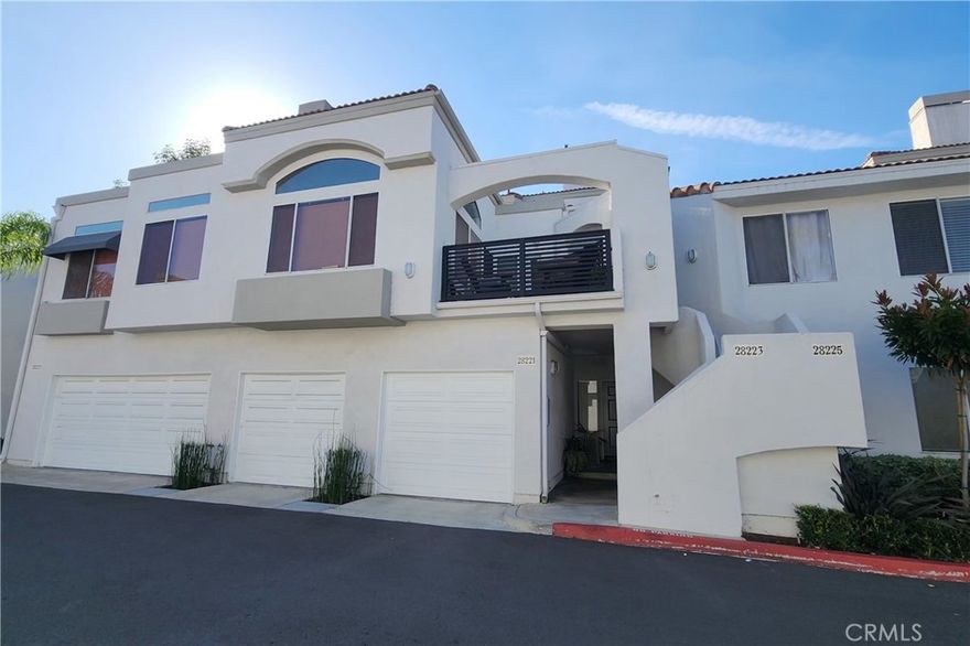 Magnificent condo offering 3 bedrooms, 2.5 baths and soaring ceilings. Main floor master bedroom features walk-in closet and full bath. Upstairs bedroom boasts its own separate bath and convenient closet. Property offers a large balcony and beautiful views of the surrounding. Easy to maintain laminate and tile flooring throughout. Feel the warmth of sunshine rays coming thru the numerous windows at the property. Spacious living and dining room offer cozy fireplace. Kitchen upgraded with granite counter tops and stainless-steel appliances. Laundry closet comes with washer and dryer. 1-car attached garage and one carport (#225). community pool and spa. Short distance to school and two large shopping centers, close to 73 toll road and 5 FWY.