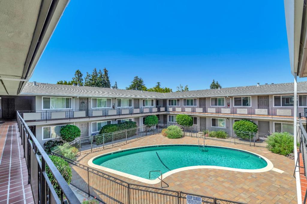 Just reduced! 398K Price reduction. Renovated two-story apartment building of 22 units. Unit Mix: (1) 2x2 ,(4) 2x1, (17) 1x1. Located in a very desirable Mountain View location for renters. Major remodel since 2015, including new roof, new gutter, new double pane windows, fresh painted interior and exterior, new pavement around pool area, new pool fence, new smoke and carbon detector in each unit, removed damaged deck ( a very costly hazard removal). Replaced two old water heater tank with two new 100-gallon water heater tank this year. 18 units have been completed renovated with new flooring, new kitchen, new bathroom, new appliances, new light fixtures, new paint. Conveniently located with easy access to: Light Rail and Caltrain Stations; Downtown Mountain View; San Antonio Shopping Center (Safeway, Starbucks, many restaurants.); Whole Foods, Target, Walmart and Trader Joes, Mountain View Public Library and Mountain View City Hall, Rengstorff Park, Shoreline Business Park (Employers include Google, LinkedIn and Intuit), El Camino Real (many retail stores and restaurants). Good schools in Mountain view/ Los Altos School district.