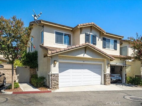 Photo of 27012 Big Rapids Loop #33 LOOP, Valencia, CA 91354 (MLS # SR26194141)