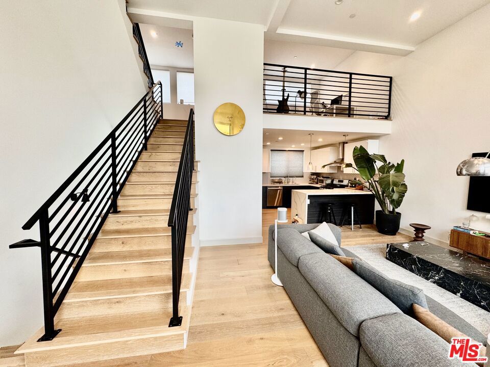 Modern 3 Bed / 3 Bath Luxury Home in Silver Lake Private Rooftop Deck + 2-Car Garage! Now available for lease stunning modern living at Glendale 5, a boutique collection of designer homes in the heart of Silver Lake. Designed by award-winning William Adams Architects, these single-family residences offer exceptional style, comfort, and convenience. This spacious 3-bedroom, 3-bathroom home features: Premium European oak flooring & custom cabinetry; Gourmet kitchen with upscale appliances all included; Open-concept living & dining area; ideal for entertaining; Two large master suites with spa-inspired baths; Versatile mezzanine perfect for third bedroom, office, or creative space; Private rooftop deck with panoramic Silver Lake views (35 ft up!); Attached 2-car garage with direct access; In-unit washer & dryer; Central A/C & heating. Located just minutes from Silver Lake's best cafes, dining, shopping, and outdoor hotspots. Enjoy the privacy of a modern single-family home with the convenience of city living. Rare rental opportunity schedule your showing today!