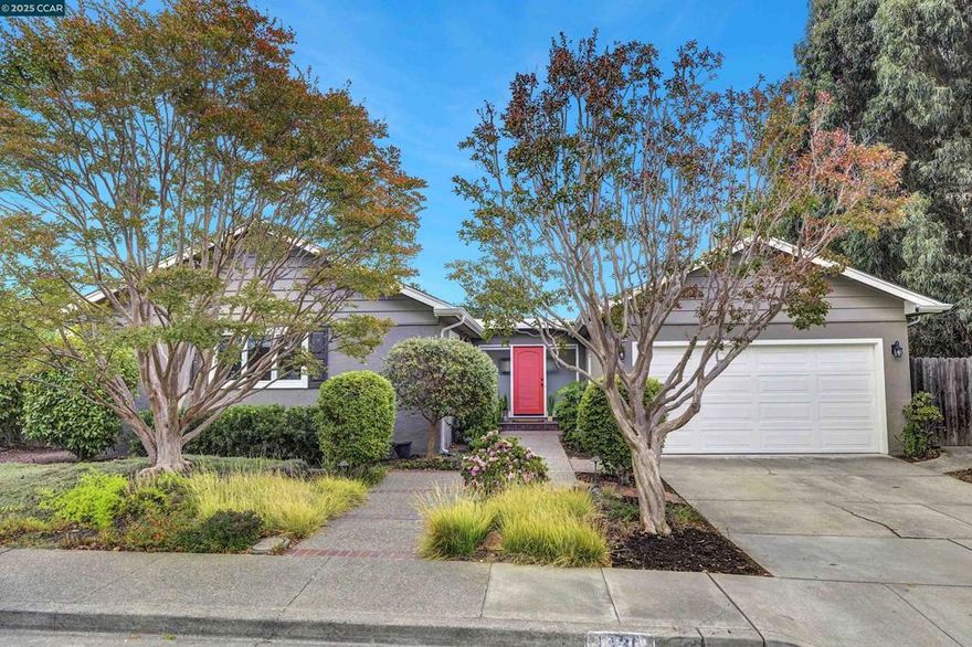 Tucked away in one of Walnut Creek’s most sought-after neighborhoods on a friendly and inviting street, this single-level ranch charmer blends modern comfort with timeless style. Just steps from the local trail system, Larkey Park, and only five minutes from downtown Walnut Creek, this home offers a rare combination of privacy, convenience, plus unobstructed views of Mt. Diablo and rolling green hillsides. The inviting floor plan features a spacious family room with vaulted ceilings, dramatic picture windows, and abundant natural light that captures the incredible scenery. The extra-wide galley kitchen includes a gas range, breakfast bar, and connects seamlessly to the bonus flex room ideal for an office, den, or formal dining space, complete with a pass-through window for added convenience. Enjoy LED lighting & hardwood flooring throughout, durable, stylish, and easy to maintain. Both bathrooms are modernized with fresh, updated finishes, and all three bedrooms offer great light and comfort. Set on a large, private lot with low-maintenance landscaping, this home invites you to relax outdoors to soak in the serene views. Additional highlights include a new energy-efficient roof (2023) and thoughtful updates throughout. Don’t miss this darling Palos Verdes gem — priced to sell!