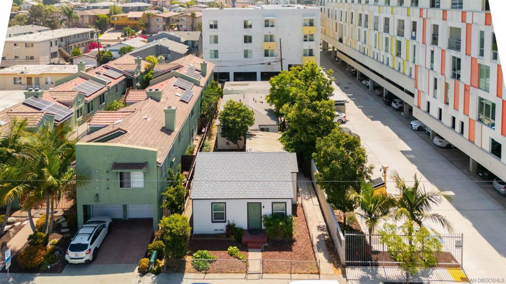 4333 Florida Street sits in the highly desirable neighborhood of University Heights, which continues to be one of the most in-demand rental markets in uptown San Diego. Built in 1953 and extensively improved in 2022, the 2-unit complex boasts a Walk Score of 95 and totals approximately 1,661 rentable square feet. The lot size is approximately 5,622 square feet and is situated in Complete Communities Tier 3 (6.5 FAR), offering future redevelopment potential. Both units are standalone cottages with no shared walls and ample yard space. The front unit is a 2-bedroom/1-bath cottage, and the back unit is a spacious 3-bedroom/1-bath cottage. Both units have been recently remodeled with new vinyl plank flooring, hardware, recessed lighting, and updated kitchens and bathrooms. The exteriors have also been extensively improved with new doors, dual-pane vinyl windows, siding, and paint. The units are ready to rent but could be further upgraded by adding in-unit washer/dryers and air conditioning. Attractive tenant offerings include ample yard and patio space for each unit and three detached single-car garages, which also have the potential for an ADU conversion. Both units will be delivered vacant, making this an ideal opportunity for investors, owner-users, and developers with ample possibilities. Located only two blocks from Park Boulevard, the property is within walking distance of all the best of University Heights. The 8 and 163 freeways are also nearby, providing easy access for tenants. 4333 Florida Street ultimately pre