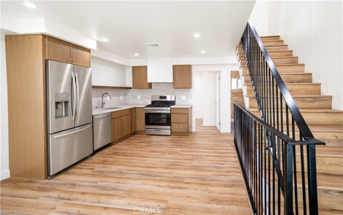 Photo of 1122 N Beachwood Drive #1/2, Los Angeles, CA 90038 (MLS # SB26215822)