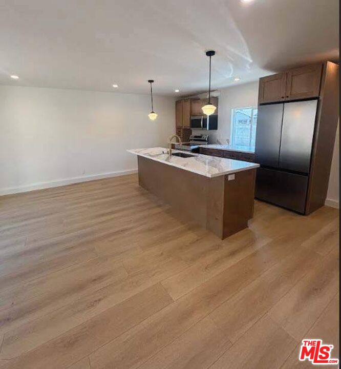Be the first to live in this beautifully built 1,200 sq ft ADU featuring a private entrance and fully fenced yard. Inside, enjoy a spacious open-concept layout, a full modern kitchen with quality finishes, and the convenience of in-unit laundry. Three bedrooms and three bathrooms offer privacy and convenience.
