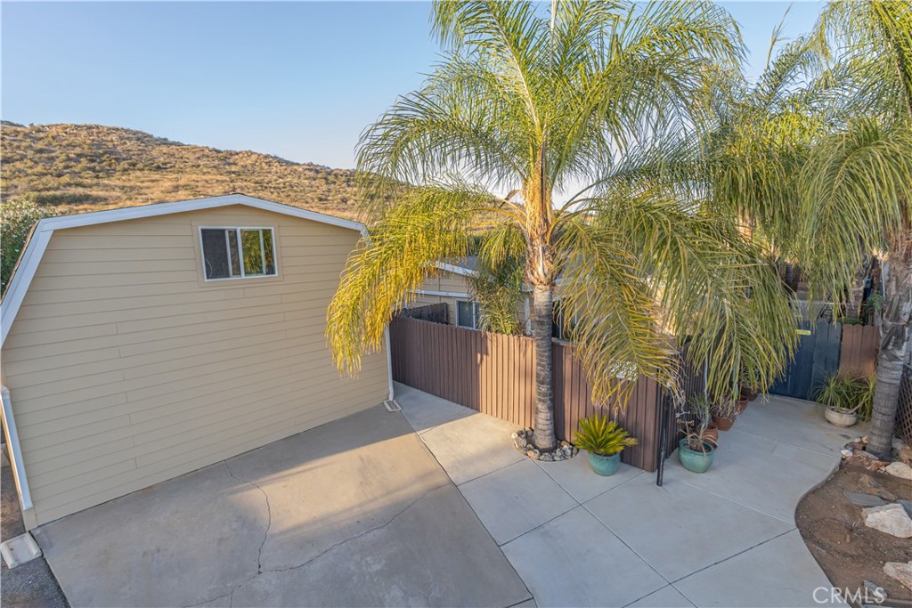 Beautifully Updated Home in the Sought-After Farm Community!
Welcome to this exceptional 3-bedroom, 2-bathroom home with a dedicated office—easily convertible to a 4th bedroom—nestled on a spacious 0.21-acre lot (approx.) and offering 1,714 sq ft (approx.) of thoughtfully designed living space. Square footage and lot size have been verified by both the appraiser and building department. Modern Comfort Meets Timeless Style This home has been lovingly upgraded with:
New roof, dual-pane windows, and earthquake piers. Open-concept kitchen and living area with granite countertops, stainless steel appliances, travertine backsplash, island, and freshly painted oak cabinetry. Tile flooring throughout most of the home, with cozy carpet in the primary suite.
Mini-split A/C, heat pump, humidifier, and fan system in 6 rooms—each with individual temperature control. Luxurious Primary Suite Retreat to your spa-inspired primary suite featuring: A custom-built walk-in closet with extensive shelving and drawers. A private bath with dual sinks, a soaking tub, and a beautifully tiled shower. Private patio access for morning coffee or evening relaxation. Outdoor Oasis Enjoy two covered and paved patios—front and back—perfect for entertaining or unwinding. The yard is a lush paradise with: 21 palm trees and 9 fruit trees, most on separate drip systems. A fully fenced yard for privacy. A barn-style garage with potential for ADU conversion and extra storage. A large driveway with ample space for RVs, boats, and motorcycles. Bonus: A soundproof wall will be installed by the city along Bundy Canyon Rd, which will enhance peace and quiet. Enjoy the perks of living in a dynamic community with 600 acres of open space, featuring: 38 acres of citrus groves. 3 pools, 2 spas, and a fishing pond. Amphitheater, sports fields, tennis & basketball courts, hiking trails, picnic areas, RV storage, and tot lots. Prime Location Just minutes from the 15 freeway, shopping, dining, entertainment, and Storm Stadium.
FHA Eligible – This well-loved home is move-in ready and won’t last long. Come see it for yourself—