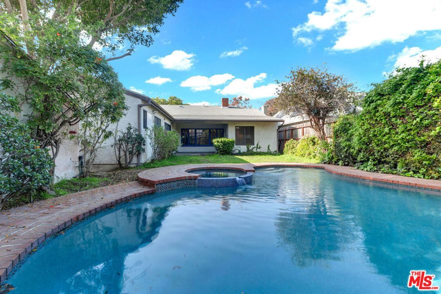 AMAZING LEASE WITH A POOL IN PRIME BEVERLY GROVE! this spacious five-bedroom, three-bathroom home offers an ideal blend of comfort, style, and location. Just minutes from premier shopping and dining, including The Grove and Beverly Center. Features include hardwood floors throughout, a large chef's kitchen with ample counter space and storage, and a formal dining room perfect for entertaining. The home offers a generous primary suite plus four additional bedrooms, providing flexibility for family, guests, or home office use. The private backyard features a pool, ideal for enjoying Southern California living year-round. Centrally located near restaurants, retail, and major thoroughfares, this is a rare leasing opportunity in one of Los Angeles' most desirable neighborhoods.