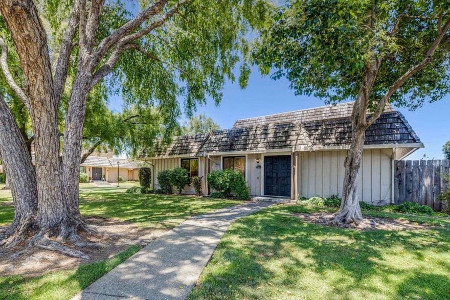 Discover a charming residence nestled in a quiet corner of Blossom Valley. This delightful single-story end unit offers 3 bedrooms and 2 bathrooms within 1,104 square feet of beautifully designed living space. Step inside to discover a bright, airy home with vaulted ceilings and numerous windows that bathe the interior in natural light. The thoughtful layout features central air conditioning, convenient interior laundry, and newer double-pane windows, ensuring comfort and efficiency year-round. Outside, enjoy a private, enclosed patio perfect for relaxing and entertaining. Additional highlights include a detached 2-car garage with built-in storage and rafter space, offering ample room for all your needs. Nestled in the Tanglewood community, you'll love the tree-lined streets and nearby amenities that make this neighborhood so special. Experience the perfect blend of tranquility and convenience in this charming Blossom Valley residence.