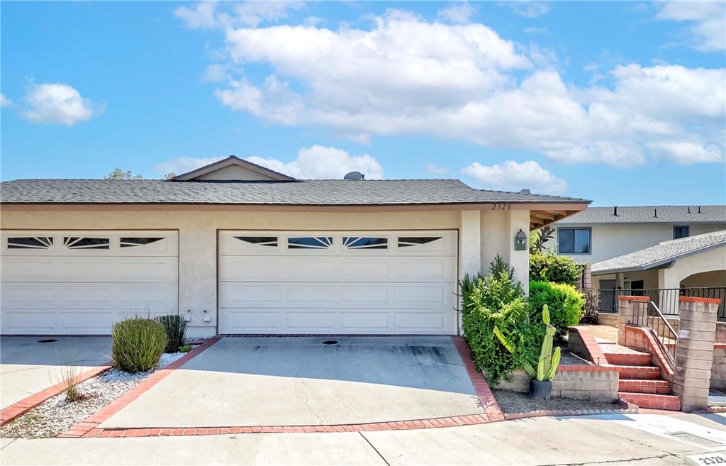 Welcome to this spacious home showcasing the largest floor plan in the tract, ideally located within the highly sought-after Brea School District. Featuring a downstairs master bedroom, soaring vaulted ceilings, and stylish recessed lighting, this residence offers comfort and function in every detail. The updated kitchen is perfect for cooking and entertaining, while the freshly painted exterior adds curb appeal you’ll love coming home to.
The 2-car garage with 240V outlet is ideal for EV charging or workshop needs. Upstairs, enjoy generously sized bedrooms designed for comfort and flexibility. Outside, the low-maintenance patio is accented with rose bushes, fresh mint plants, and a fruiting kumquat tree, creating a charming outdoor retreat.
All of this is set in a prime location—walking distance to Birch Hills Golf Course and Country Hills Elementary School. With its thoughtful upgrades and unbeatable setting, this home is the perfect blend of space, convenience, and style—ready to welcome its next owner.