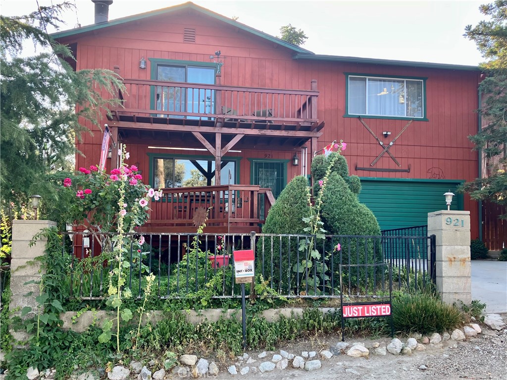 Tranquil Mountain Retreat: 921 Piru Way
This gorgeous three-bedroom, office, and two-bathroom home offers the perfect blend of comfort, beauty, and functionality for your family. Meticulously maintained throughout, this property delivers mountain charm with modern conveniences.
Interior Features
Spacious living room featuring a cozy wood-burning fireplace, ceiling fan, and garden views
Bright, well-appointed kitchen with ample cabinetry, soft closing drawers, garden window, gorgeous granite countertops, and breakfast counter - all with Luxury Vinyl Flooring throughout the downstairs areas - perfect for the 4 seasons climate.
Family-friendly dining area overlooking the private backyard, keeping the open floor plan design
Four large bedrooms upstairs, including the primary with a private view deck showcasing stunning valley and mountain vistas
Upstairs bathroom with dual sink vanity and convenient washer/dryer closet
Laminate flooring and carpeting for added warmth for snowy winters
Mini-split heating and cooling system for the main floor and a window air conditioner upstairs. Central heating and a cozy wood-burning fireplace for those winter days.
Outdoor Oasis
Private, fully landscaped garden with mature plants and privacy fence
Relaxing barbecue deck for entertaining, along with a pizza oven for you pizza enthusiasts.
A tranquil water feature nestled beneath a lush rosebush
Multiple shaded seating areas throughout the garden
Front deck with mountain views
Sprinkler and drip irrigation systems for easy watering and garden maintenance.
Security system installed.
Solar panels keep the utility bills to a minimum.
Option to purchase an additional vacant lot with the right offer:
Additional lot across the street with greenhouse and storage shed
Ample additional parking space
Garden area with two water condensers
Convenient location just 35 minutes from both Bakersfield and Valencia for easy commuting
This Frazier Park gem offers the peaceful mountain lifestyle you've been seeking with all the amenities your family needs. Schedule your viewing today!