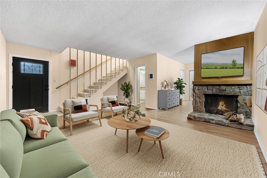 Discover downtown living at its finest in this beautifully updated 2 Bedroom, 1.5 Bathroom townhouse located near vibrant Pine Avenue, the beach, and train station. This two-story gem offers the perfect blend of comfort, convenience, and coastal charm. Features you'll love include an open floorplan with two floors of living space, cozy fireplace in the living room, brand-new carpet and fresh paint throughout, durable and modern LVP flooring, private patio which is ideal for morning coffee or evening relaxation, low HOA dues, and....a PRIVATAE GARAGE!!! Enjoy the best of Long Beach with walkable access to shops, restaurants, nightlife, and the waterfront. Whether you're a first-time buyer, downsizing, or investing, this move-in-ready townhouse is an opportunity you don't want to miss!!!