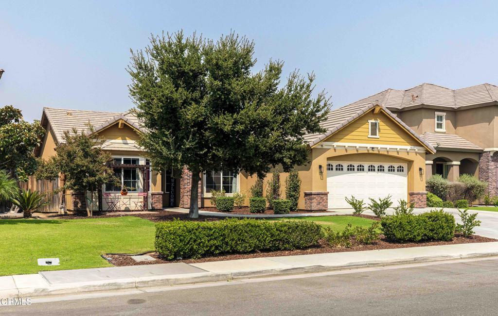 Move-in ready single-story home with 3 bedrooms, 2 baths and an open, versatile layout. The flexible bonus room near the entry is ideal as an office, playroom or den. The great room connects seamlessly to a gourmet kitchen w/ granite counters, a center island w/ sink, subway-tile backsplash, pendant lighting, stainless-steel appliances and ample cabinetry. The private primary suite offers a walk-in closet, dual-sink vanity, soaking tub and separate shower. Two additional bedrooms share a hall bath w/ dual sinks. A spacious laundry room w/ upper cabinets and direct garage access adds convenience. Wood-look tile flooring highlights the main living areas. Outdoors, relax under the covered patio w/ ceiling fan, gather around the fire pit, or enjoy the above-ground pool w/ elevated wood deck. The yard also features mature trees, raised planters and plenty of room for entertaining. Blending comfort, function and outdoor amenities, this home is a great opportunity in a desirable location.