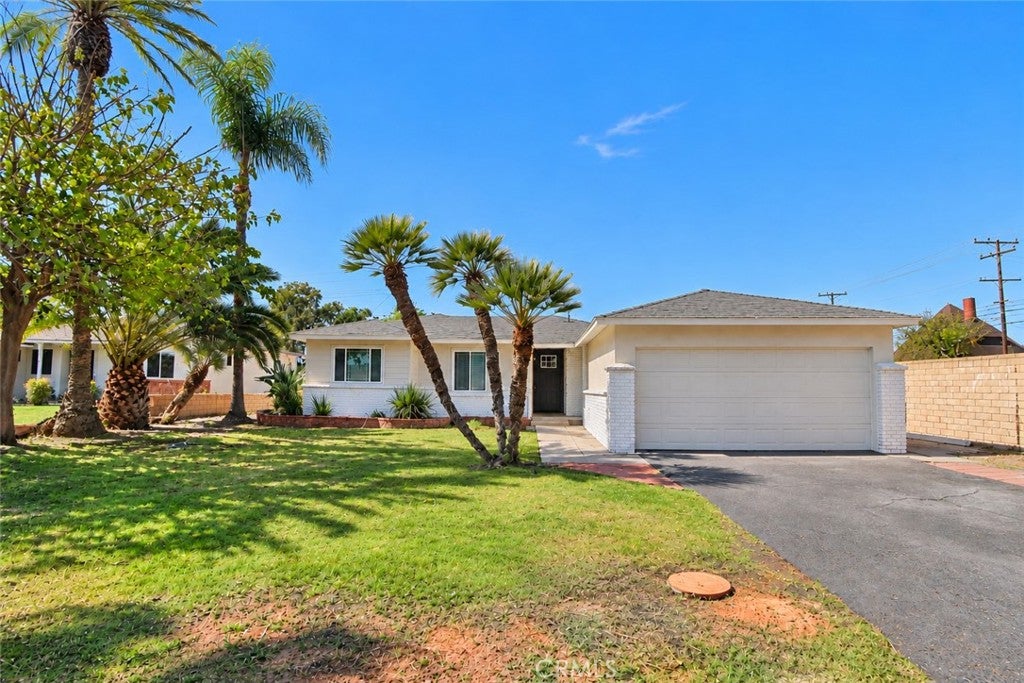 Photo of 12001 Firebrand Street, Garden Grove, CA 92840 (MLS # PW26226903)