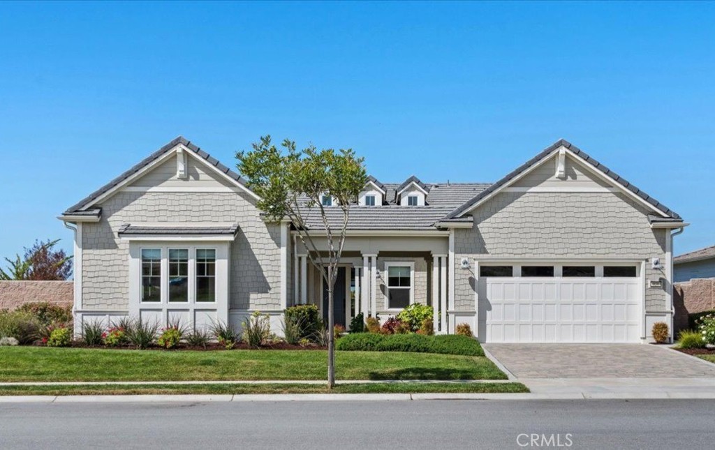 Located in the luxurious Trilogy at Monarch Dunes community, this upgraded Riviera model home offers 3 bedrooms, 3.5 baths, and 2,696 sq ft of open-concept living on a 9,600 sq ft lot. Built in 2020, highlights include an air-conditioned guest casita with a private entrance, a gourmet kitchen with quartz countertops, GE Profile appliances, and a large island. Spacious pantry includes wine fridge. The home features wood flooring, soft closing white shaker cabinets and drawers, a Smart Space with laundry and built-in desk, and abundant natural light. The master suite boasts a spa-like bathroom and walk-in closet. Outdoor living is enhanced with a fireplace, multiple entertaining areas, and views of sand dunes and the ocean on clear days. 3-car tandem garage and solar. Trilogy amenities include Adelina’s Bistro, Sandalwood Spa, champion designed golf course, tennis, pickleball, and bocce ball courts. Move-in ready and ideal for both relaxation and entertaining. This home is immaculate and ready to be yours today.