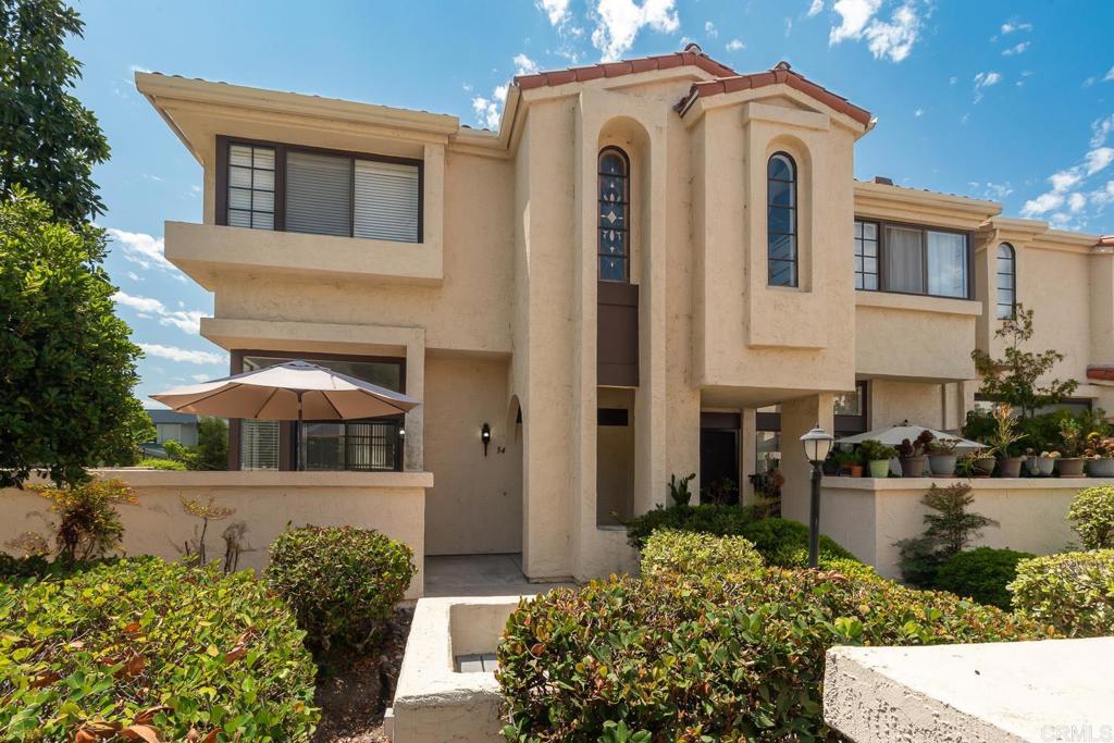 Tri-level end-unit condominium with southern and eastern exposure. Features 3 bedrooms, 2.5 bathrooms, and 1,474 sq ft of living space. Includes a built-in 2-car garage with laundry area. All living areas are heated and cooled. HOA covers trash, water, sewer, exterior building maintenance, and common area upkeep.