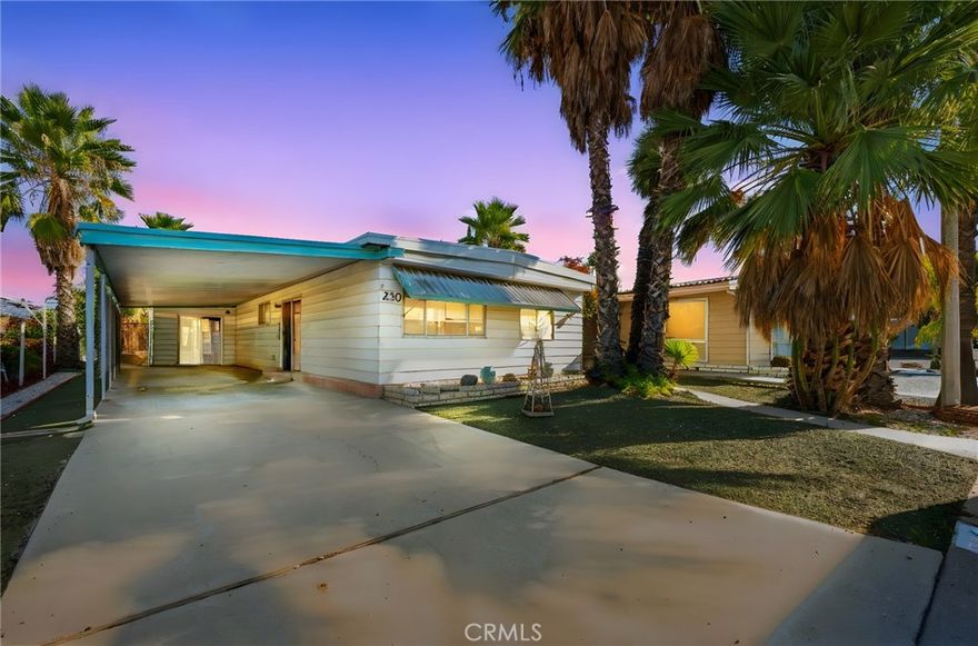 Welcome to Sierra Dawn Estates! Discover this beautifully refreshed 2-bedroom, 2-bath home situated on a spacious corner lot in one of Hemet’s most desirable 55+ communities. This move-in-ready residence features a recently renovated kitchen with sleek quartz countertops, modern cabinetry, and stylish finishes. The interior boasts new luxury vinyl plank flooring and fresh interior paint, creating a bright, modern feel throughout. Enjoy comfortable living spaces filled with natural light and a functional layout perfect for everyday living or entertaining. Additional highlights include washer and dryer hookups, a covered carport with parking for two vehicles, a large extended driveway, and a private backyard ideal for relaxing or outdoor gatherings. Residents of Sierra Dawn Estates enjoy access to multiple clubhouses, swimming pools, a spa, fitness center, and a full calendar of social activities, all within a friendly, well-maintained community. Move-in ready, beautifully updated, and set on a larger corner lot with a private backyard and extended driveway — this home is a must see!