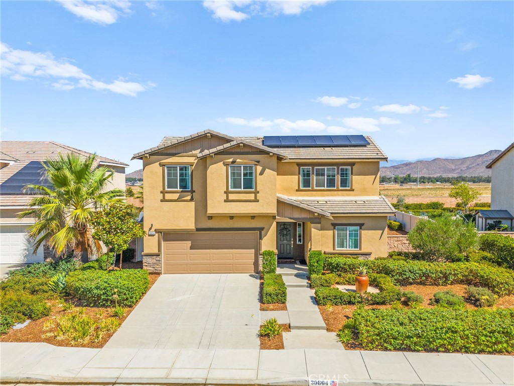 Welcome to this beautifully updated former model home in the heart of Winchester! Designed with comfort and functionality in mind, this open floor plan is filled with natural light, modern finishes, and thoughtful upgrades throughout. The main level features a primary suite with spa-like bath plus an additional bedroom and full bath—ideal for multi-generational living or guests. The lower level features luxury vinyl plank flooring and high end carpet in the bedrooms and upstairs. Upstairs, you’ll find a spacious loft and three more bedrooms, offering plenty of room for everyone. The kitchen flows seamlessly with quartz counters, and a kitchen island into the dining and living areas, perfect for entertaining, while the huge backyard provides endless potential for a pool, garden, or custom outdoor living. Energy efficiency is built right in with a solar lease at only $97.42/month, helping you save on utilities. Plus lower taxes than your average new construction home. This is BETTER. Nestled in a quiet neighborhood yet close to shopping, dining, and schools, this Winchester gem truly has it all. Furniture can be included.