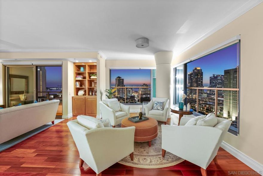 Elevated living the in the semi penthouse at Renaissance with almost 4,000 SF of panoramic and unobstructed western and northern views. Flooded with natural light through walls of telescopic windows which slide all the way open, showcasing spectacular views of the bay, ocean and city to Point Loma, and past Coronado. This corner residence boasts 3 huge bedrooms plus an office surrounded by glass walls with the most stunning views ever, 2 stories, 4 balconies, 2 fire places, 2 side-by-side parking, and 2 storage units. Renaissance will soon have a brand new “street level” lobby and new resort style amenities as seen in the Virtual Tour.  Upon entering the first level, you are welcomed by cathedral ceilings that enhance the light-filled, open layout. Gorgeous maple hardwood floors flow throughout the living area, complemented by telescopic windows that fully open, inviting the soothing ocean breeze inside. The family room, featuring eastern views, opens to the kitchen equipped with an island, an under counter wine cooler, ample storage, and a walk-in pantry. Enjoy three walk-out balconies on this level: two offering eastern views and one facing west for stunning sunsets. Two fireplaces enhance the ambiance: one in the living area on the first level and another in the primary bedroom suite. A large guest suite provides unobstructed panoramic water and city views, complete with custom shutters for adjustable light control and includes a walk-in closet and an ensuite bathroom with a multi-jet shower. A powder room convenient for your guests. Located on the second level, bedroom 2 features a spacious layout, a gigantic walk-in closet, and a walk-in shower with custom lighting. The expansive primary suite spans boasts nearly 900 square feet and includes crown molding throughout. The fireplace creates a cozy atmosphere, complemented by a comfortable sitting area by the window. Enjoy a luxurious Jacuzzi tub, dual sinks, and a multi-shower fixture in the primary ensuite catering to your every need.  A large west-facing balcony off the primary bedroom offers beautiful sunset views while ensuring privacy. Adjacent to the primary suite is a large office with stunning north and west views through walls of glass, showcasing sparkling water and city lights, along with enhanced privacy. A spacious and private balcony directly off the primary suite offers uninterrupted water views, perfect for romantic evenings or enjoying a good book while watching boats, yachts, and the cityscape extending to the mountains.Two side-by-side parking spaces and two storage areas—one large cage and a temperature-controlled storage room for valuable items like artwork. Renaissance will soon have a brand new “street level” lobby and new resort style amenities including a large landscaped courtyard w/ BBQ aren, 3 fire pits w/ a dining area, pool/spa, gym, community lounge w/ full kitchen, conference room, surveillance throughout the community & 24/7 desk attendants. Ground floor retail conveniently includes Postal Annex for easy Amazon returns, Discount Nutrition & Vitality Juice, Rolling Out Bakery, Vases Salon, iTan and Wells Fargo.  Located across from Ralph’s 24 hr. grocery w/ cafes on every corner, steps to the waterfront and Little Italy & just minutes to airport & public transportation and a ferry ride to Coronado. Welcome to paradise!