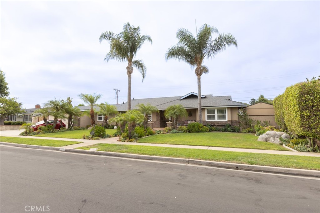 Welcome to this beautifully upgraded single-family home in the heart of Tustin, offering 3 bedrooms, 2 bathrooms, and 1,691 square feet of turnkey living space on an expansive quarter-acre lot. Lots of thoughtful updates in the past five years, with just a few being a new roof and paid-off solar panels (2022), a completely remodeled Pebble Tec pool (2023), a new water heater and jacuzzi (2024), and a new AC system and ductwork installed just three months ago (April 2025). Full list of updates available upon request. Ideal for families and entertainers alike, the spacious backyard is your private oasis complete with professional-grade Viking BBQ, beverage fridge and kegerator! There is also a large grass area offering plenty of room to gather, relax, and enjoy. Located within the highly rated Tustin school district, with schools including Guin Foss Elementary, Columbus Tustin Middle, and Foothill High School within its boundaries. With a low tax rate and no compromises, this move-in-ready gem is the perfect place to call home. Make sure to check out the 3D tour at https://my.matterport.com/show/?m=GGMUhR78vnw&mls=1