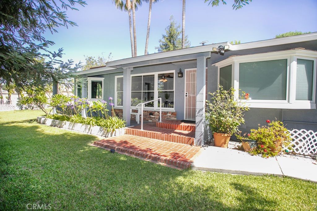 Welcome to your dream home! This beautifully maintained 4-bedroom, 2.5-bath ranch-style residence offers 2200 square feet of comfortable living space on nearly a half-acre private park-like grounds. Tucked away at the end of a quiet cul-de-sac, this home is the perfect blend of tranquility and convenience. Step inside and discover a spacious layout, highlighted by a remodeled primary suite complete with modern finishes and a spa-like bathroom. Complete with generous living and dining areas, this home is ideal for entertaining or relaxing with family. Outside, enjoy your own personal oasis with a refreshing pool, babbling brook water feature, and lush landscaping that creates a peaceful, retreat-like atmosphere. The 3-car garage and driveway offer ample storage and parking, and a newer roof provides peace of mind for years to come. Whether you're hosting summer gatherings or enjoying quiet evenings under the stars, this home offers the perfect setting. With its private location, expansive lot, and thoughtful upgrades, this is a rare find you won't want to miss.