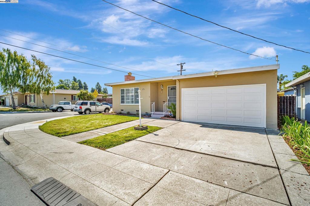 A warm, comfortable & charming home with 3 bedroom,2 baths and approx. 1582 sq. ft. Excellent layout with lots of natural lights. Fresh interior custom paint throughout. Move in condition with brand new top quality flooring throughout. Spacious living room with built-in shelves over cozy fireplace. Wood shutter blind throughout except 2 bedrooms. Gourmet kitchen with new refrigerator, granite countertops with lots of cabinets. Skylight in kitchen & both bathrooms. Dining room with new ceiling light. Hugh family room off to a relaxing deck, low maintenance back yard with sparking pool to entertain your friends & family. Just steps from 880/92, schools, shopping Malls and restaurants.