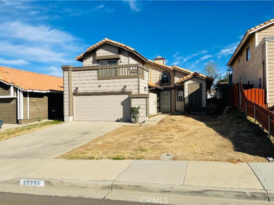 BEAUTIFUL, two-level home in Menifee with 3 bedrooms, Plus Loft, 2-1/2 baths, and a 2 car garage. The downstairs has an open floor plan with living room including a cozy fireplace, adjacent dining area, kitchen with granite countertops including a breakfast bar area, new appliances, 1/2 bath and the spacious primary bedroom, bath and walk in closet are also downstairs. The laundry area is in the garage. The home has high ceilings and the upstairs has a Loft, 2 more bedrooms with a full bath and linen cabinet in between. The West end bedroom is large and has direct access to the upstairs bath and also has a large balcony overlooking the hills to the West. The home has newer interior and exterior paint, new carpet, new blinds, and ceiling fans. This home is near McCall and Murrieta Rd., so it is close to shopping, restaurants and in between the 15 and 215 Freeways for commuting. The front and backyard landscaping are a work in progress and maintained by a gardener. The backyard has a patio area ready for your patio set and BBQ! A Must See!