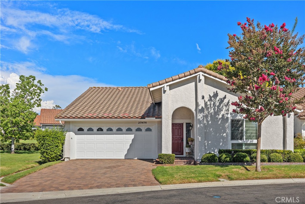 JUST LISTED IN THE GATE-GUARDED SENIOR COMMUNITY OF CASTA DEL SOL! This corner-lot Casa Narciso model home offers a 2+den floorplan, 2 bathrooms and 1,495 sqft of interior living space. Quality features include PEX-A re-piping, dual-pane windows & sliders throughout with custom cased vinyl shutters, updated Carrier HVAC system, and a remodeled kitchen with permitted partial wall removal, granite countertops, subway & glass tile backsplash, stainless steel appliances, updated cabinetry with pull-out shelving, and a large peninsula with added storage, under-counter beverage refrigerator, and breakfast bar. The spacious master bedroom sits at the back of the home with high cathedral ceiling and an en-suite bath featuring step-in shower with comfort seat, product shelving, convenient grab bar, and frameless glass doors. There is also a vanity seating area and custom closet shelving & storage by California Closets. The home also includes a formal dining room for guests & family, living room with central fireplace & vaulted ceiling, a cozy den that can also be used as a third bedroom, and another guest bedroom with added linen storage cabinets and AMAZING Italian LGS queen-size Murphy bed & work station (see photos!) This included item is a masterpiece that lifts & swivels to go from work/craft desk to sleeping area in seconds. Other features include crown molding & oversized baseboards, added cooling fans throughout, recessed lighting, and a big 2-car garage with cabinet storage, pull-down attic access ladder and permitted EV charger. Out back you will find a PRIVATE covered brick patio with barbecue and vinyl patio cover - as well as a full-length gated side yard perfect for pets or storage. Also includes convenient video doorbell, electronic auto-locking front door, rain gutters, Spanish clay tile roof, and a BEAUTIFUL full-pavers driveway. Full access to all Casta del Sol community amenities, Mission Viejo Lake membership, no Mello Roos, and a low 1.09% tax rate!
