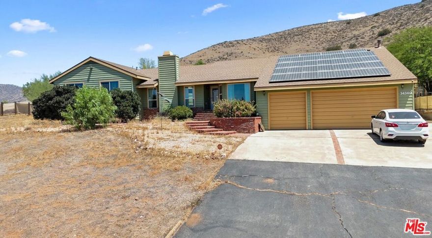 Magnificent 5 acre Acton, Estate Home with Fabulous Professional Recording Studio. The home has paid off Solar panels.  Large gourmet kitchen, for entertaining.  Mountain views abound, very quiet and peaceful for getting the creative juices flowing.  RV parking with a large 3 car garage.