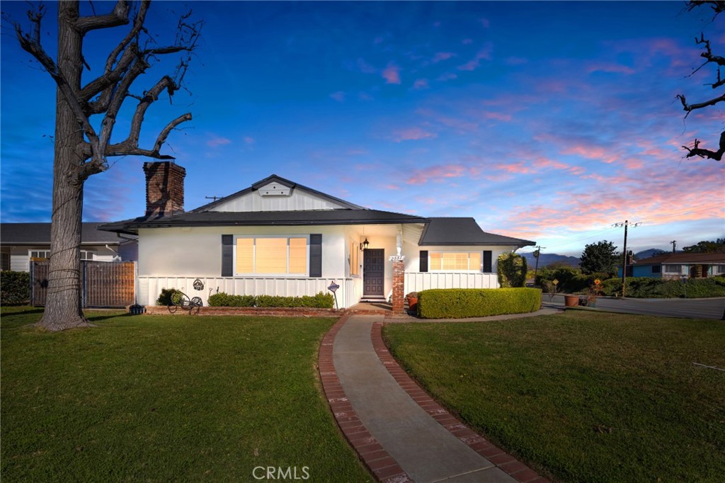 Nestled in the coveted South Hills of West Covina, this exquisite pool house embodies the perfect blend of luxury, comfort, and functionality. Boasting a spacious 4-bedroom, 2.5-bathroom layout, this home has been meticulously upgraded with fresh paint and stunning new flooring throughout, offering a modern and sophisticated aesthetic. The heart of the home is the gourmet kitchen, featuring custom-built cabinetry, a double stainless steel oven, and a built-in gas range integrated into a spacious kitchen island. A sleek stainless steel mini beverage fridge and a built-in microwave further elevate this space, making it ideal for entertaining or everyday cooking. The family room, surrounded by elegant brickwork, offers the perfect atmosphere for relaxation or as a media room. The main bathroom is a true sanctuary, with luxurious marble tiling framing a freestanding tub, a separate glass-enclosed shower, and high-end finishes that exude spa-like tranquility. Designed for ultimate indoor-outdoor living, the property includes a sparkling pool and spa, making it the perfect destination for both intimate gatherings and large-scale celebrations. The expansive circular driveway provides ample parking, in addition to the 2-car garage, ensuring convenience for guests. Located just minutes from parks, top-rated schools, and with easy access to the 10 freeway, this home offers the ideal combination of privacy, luxury, and accessibility. Whether you're lounging by the pool or enjoying the comfort of the meticulously designed interior, this home promises a lifestyle of unparalleled sophistication.