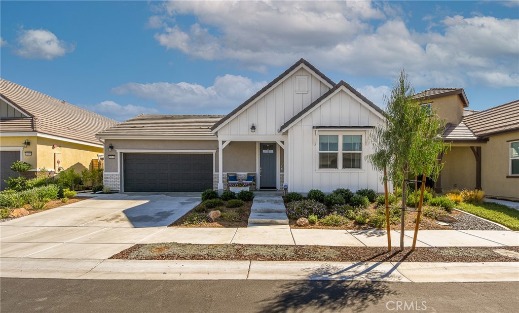 Welcome to this stunning single-story home located in the highly desirable Esplanade 55+ gated community at Sommers Bend. Offering 1,967 sq. ft. of thoughtfully designed living space, this residence features 3 bedrooms, 2.5 bathrooms, and a 2-car garage with an electric car charger outlet and paid off solar.
Step inside to an open-concept floor plan highlighted by a huge center island, LVP flooring, and spacious rooms filled with natural light. The modern kitchen is equipped with GE appliances, perfect for everyday cooking and entertaining. The third bedroom offers flexible use as a guest room, home office, or hobby space, with its own sliding door out to a cute little courtyard. (note: no closet).
Enjoy indoor-outdoor living with a professionally landscaped backyard, covered patio, and plenty of room to relax or entertain.
Living in Esplanade means more than just a home – it’s a lifestyle. The community offers a resort-style pool and spa, clubhouse with kitchen and multipurpose spaces, fitness center, pickleball and bocce ball courts, outdoor gathering areas with fire pits and barbecues, and miles of scenic walking, biking, and horseback riding trails. Located just minutes from Temecula Wine Country, you’ll love the balance of tranquility and convenience. Also, did we mention the Hot Air Balloons that fly overhead.
This home is truly move-in ready – all that’s missing is you!