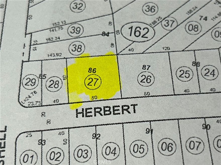 A nice Lot located on a dirt road in the Country Club Heights. Great for investment or to build. Buyer and Buyers agent to verify the buildability of this lot and the dirt road issue.