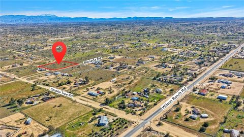 Photo of 10435 Manada Rd, Phelan, CA 92371 (MLS # CV26013493)