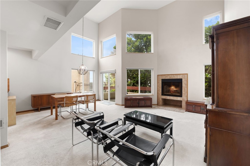 First Time on the Market in Over 30 Years! Discover this delightful 2-bedroom plus loft, 2-bathroom condo in a charming 8-unit building, ideally situated in the heart of Los Angeles. This rear second-story unit offers high ceilings and an abundance of natural light, creating an inviting and airy atmosphere. The main level is thoughtfully designed with a spacious primary bedroom featuring an en-suite full bath, while the second bedroom is conveniently located across from a three-quarter bath.
A unique highlight of this home is the second-floor loft, complete with a wet bar—perfect for entertaining or relaxing evenings. The living area is spacious, offering a seamless flow for both everyday living and hosting guests.
Constructed with quality, this unit includes modern amenities like in-unit laundry hook-ups and secured parking, ensuring convenience and comfort. Its prime location offers easy access to vibrant city life, with shops, dining, and recreational opportunities nearby. Don't miss it!
