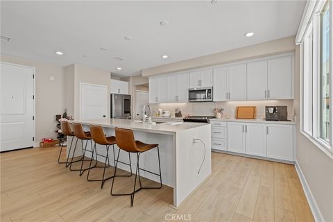 Photo of 16289 Dawn Way Way #209, Tustin, CA 92782 (MLS # PW26146568)