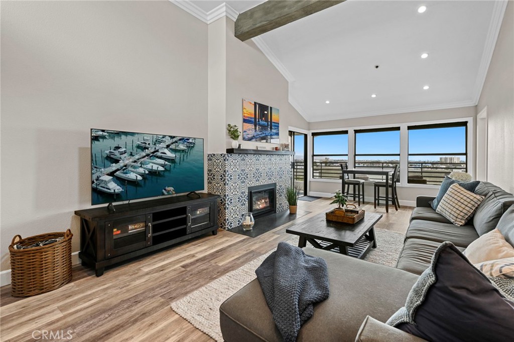 Furnished Lease | Available November 1, 2025 – April 30, 2026
Experience coastal living at its finest, in this renovated, single-level penthouse condo in the gated community of Villa Balboa. This fully furnished 2-bedroom, 2-bath residence offers breathtaking ocean and harbor views.
Inside, you’ll find a thoughtfully designed open floor plan with stainless steel appliances in the kitchen, gorgeous upgraded bathrooms, and well-appointed furnishings throughout. Natural light pours in through expansive windows, and the private balcony is perfect for enjoying sunsets over the water. Two reserved spaces in the underground parking garage provide both convenience and security.
Residents enjoy resort-style amenities, including a pool, spa, tennis courts, pickleball, fitness center, clubhouse, and direct access to Newport’s scenic walking and biking trails. Just minutes from beaches, Newport Harbor, the Peninsula, and world-class shopping, dining, and entertainment.
Welcome to 260 Cagney Lane #313