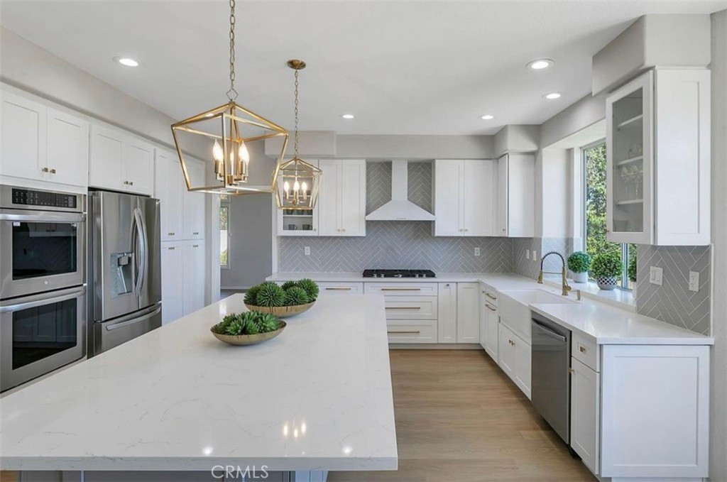 Newer well remodeled home nestled in one of the most desired gated communities in Calabasas!!! This property calls for an open floor plan that consists of 5 Bedrooms + office or bonus room + 3 baths, and spectacular views of Calabasas Hills! This beautiful home features soaring ceilings, grad new chandeliers, all newer flooring, newer paint throughout, newer kitchen cabinets with oversized island, new appliances, completely new bathrooms, new tiles, huge master bedroom with vaulted ceilings, incredible views, new master bathroom with a walk-in closet and an entertainers back yard nicely landscaped. Amazing panoramic views. Just minutes from The Commons, Calabasas Lake, Calabasas Tennis and Swim Center not to mention the award-winning Las Virgenes School District. Two gated community pools and a pool house. Home is available immediately.