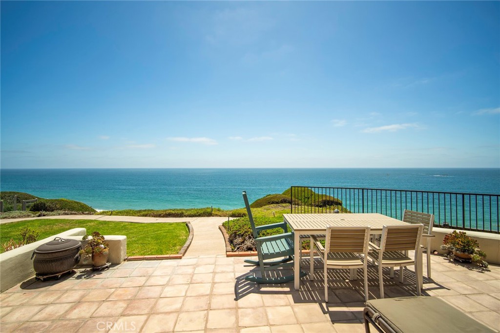 Location, Location, Location! Get mesmerized by the bluff front, white water ocean view from this historic property Casa De Marca. Welcome to this stunning 3-bedroom, 2-bathroom home located in the beautiful South West San Clemente. This property boasts an array of luxurious amenities that are sure to impress. Just painted interior. Tile floors throughout and new Carpet in two of the bedrooms. Step out onto the large deck and soak in the amazing ocean views that stretch for miles, or unwind in the community hot tub after a long day. There are two carports in under ground parking garage with two storage boxes. This home is conveniently located on the bluff next to State park and Steps to the beach, making it perfect for those who love the ocean. Inside, you'll find an atrium in the middle of the room, providing a unique and tranquil space. The large, spacious kitchen is a chef's dream, equipped with everything you need to create culinary masterpieces. With white water views that will take your breath away, this home truly offers a luxurious and serene living experience!