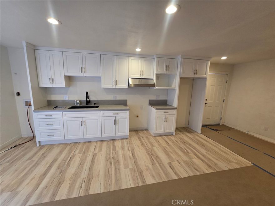 LEASE AVAILABLE (Middle Unit) – Welcome to your brand new home, located in a newly built triplex! This beautifully designed middle unit offers modern finishes throughout and is nestled in a quiet single-family neighborhood.  Enjoy the comfort of a split air conditioning system, a brand new modern kitchen with a stylish farm sink, and a stove included for your convenience. Washer and dryer hookups (stackable) make laundry easy and accessible.  Tenant pays for their own utilities.   Everything in this home is brand new — move in and be the first to enjoy it all!